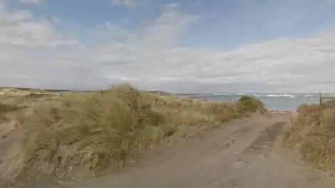 Two people dead, third in hospital after boat capsizes at Manawatū beach